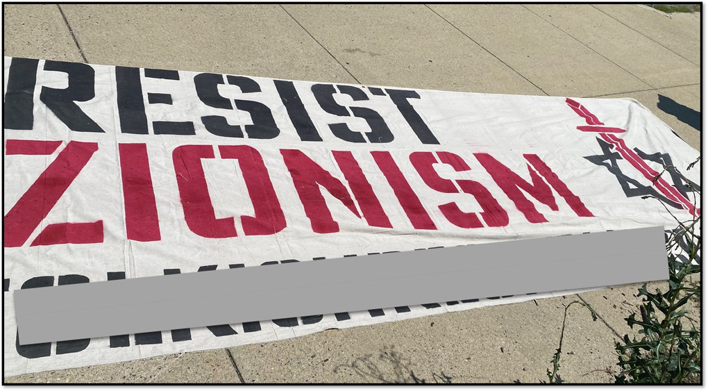 Sample of antisemitic banner from FRM