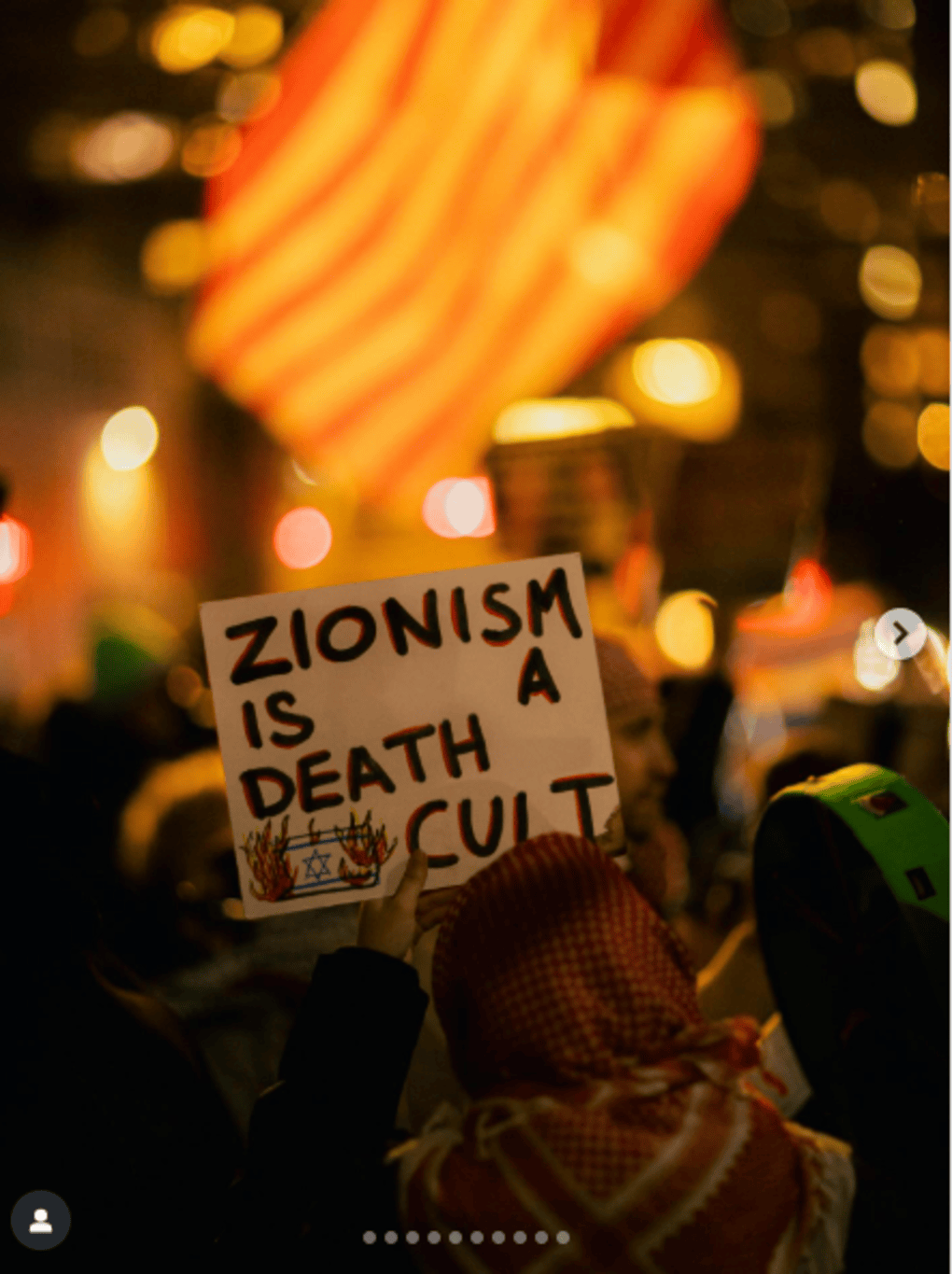 Photo: An image of a sign reading: “Zionism is a death cult,” outside the November 19, 2025, Park East Synagogue protest in Manhattan. (Screenshot/Instagram)