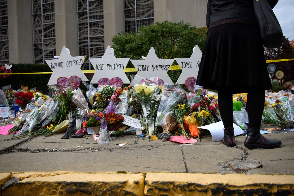 Photo: Mourners visit the memorial outside the Tree of Life Synagogue on October 31, 2018, in Pittsburgh.