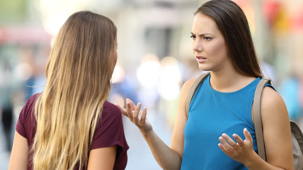 Two young women arguing