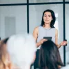 Businesswoman leading training class for professionals
