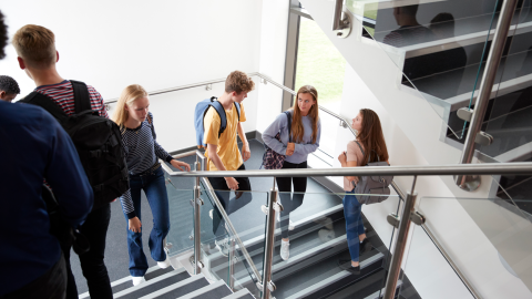 High school students walking on stairs